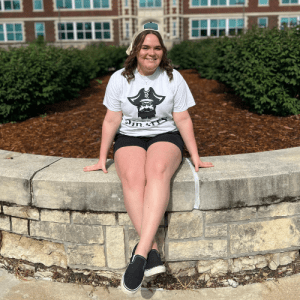 Student in front of Geyer Hall walkway
